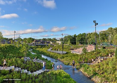 Looking downstream at Grand Junction Park where visitors walk on stepped walkways down to restored Cool Creek 