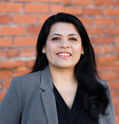 A portrait of Priyanka Malik.