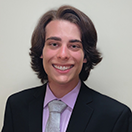 Adolfo Martinez smiles